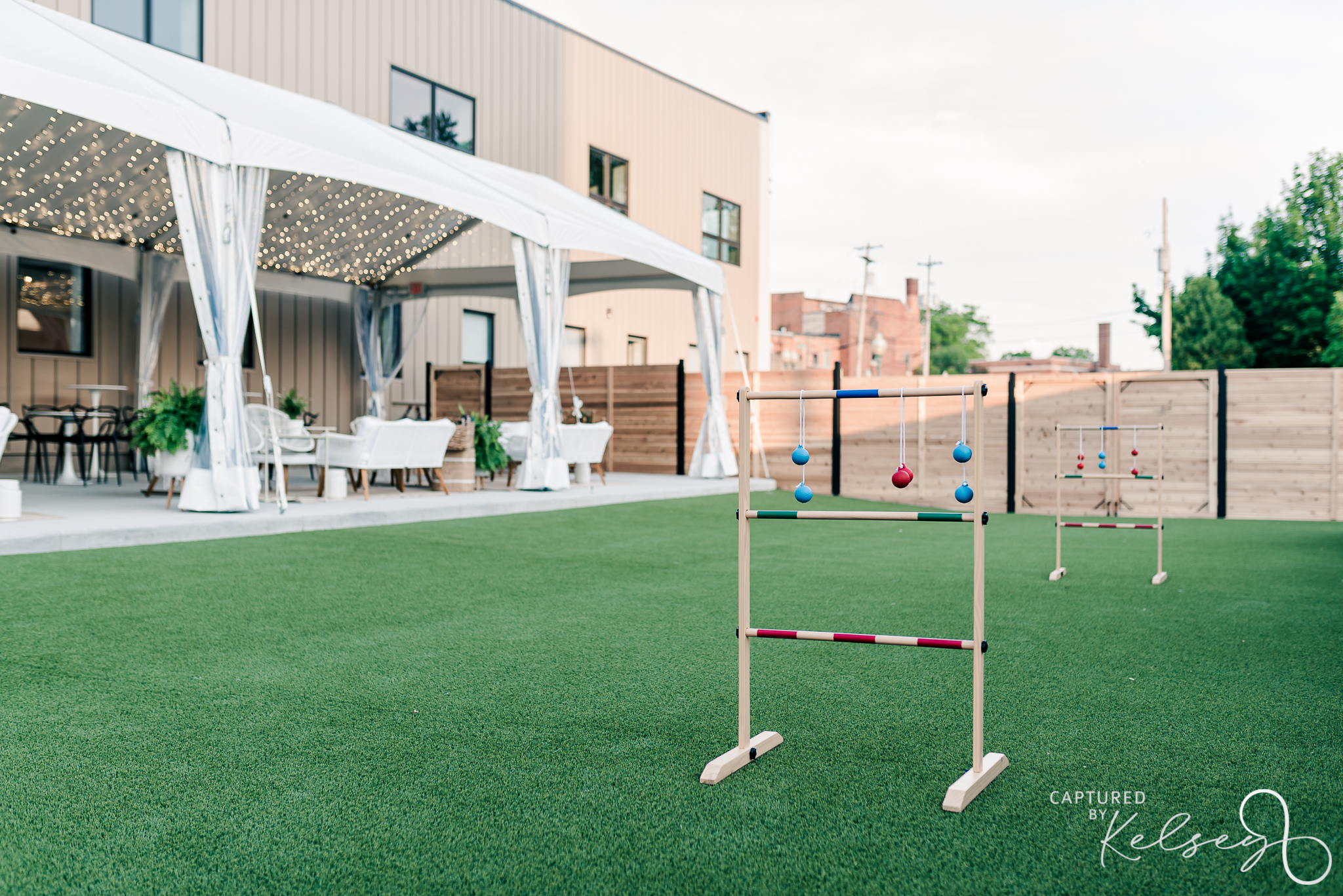 ANN-ARBOR-WEDDING-PHOTOGRAPHER-THE-COLLINS-OFF-MAIN-CAPTURED-BY-KELSEY-BLOG-7 the collins off main outdoor space with lawn games and tented cocktail lounge