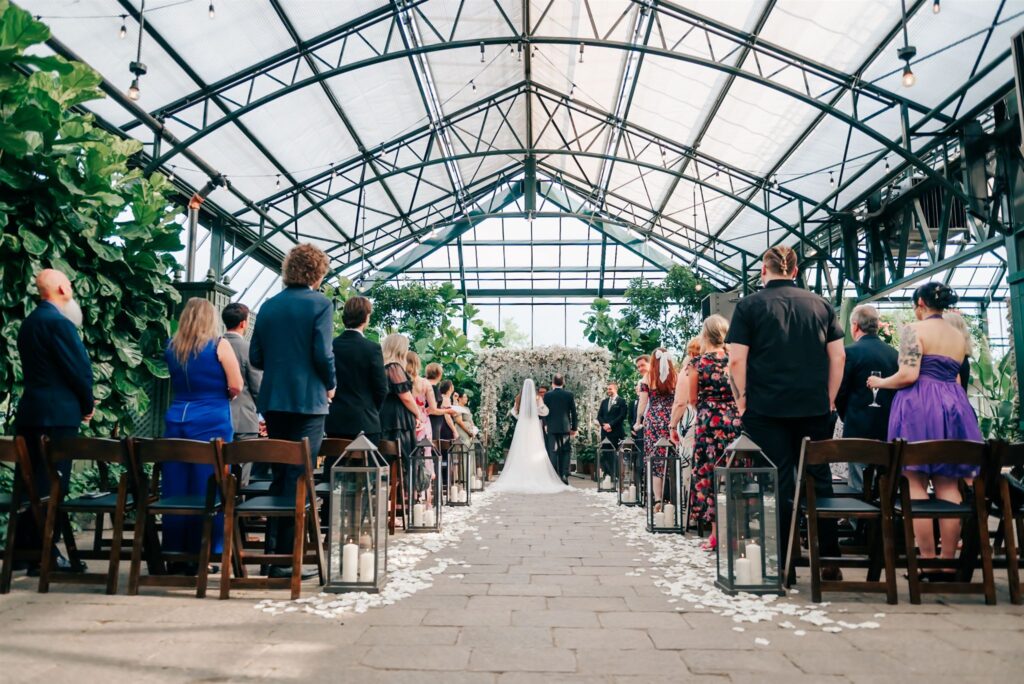 Wedding ceremony at The Planterra Conservatory wedding venue in Michigan