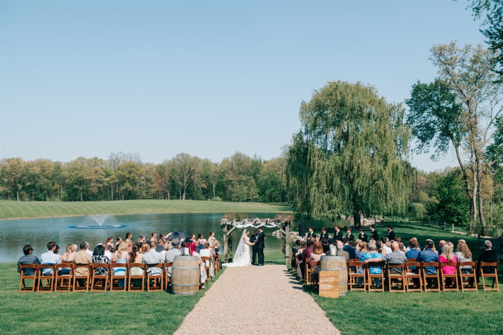 Wedding ceremony waterfront at Westers Vineyard in Michigan