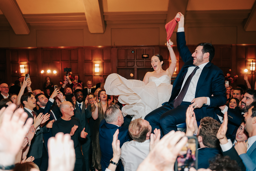 Couple laughing and dancing at Michigan League Ballroom